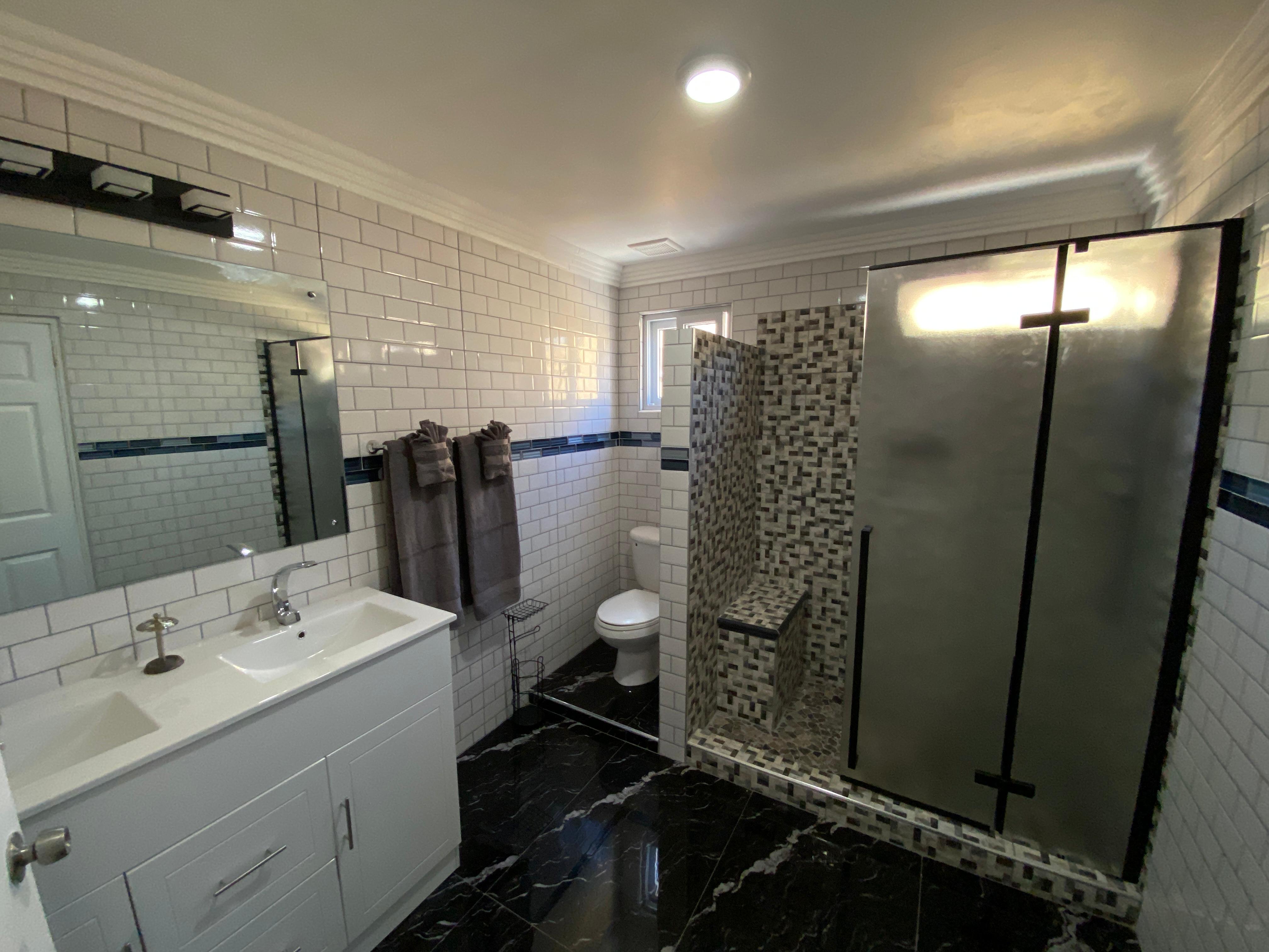 Clean and modern bathroom at The Courtyard Suites