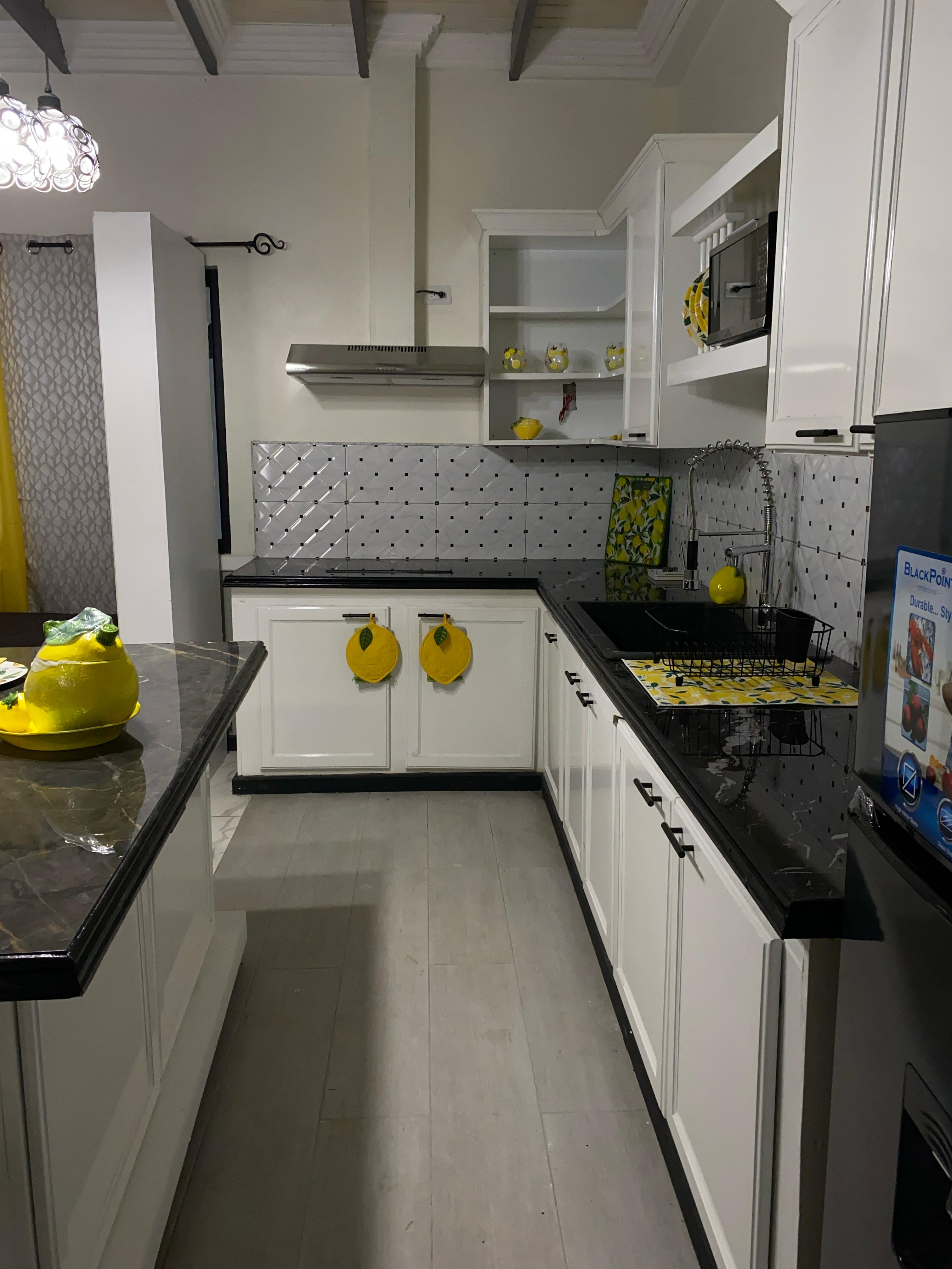 Modern kitchen facilities at The Courtyard Suites